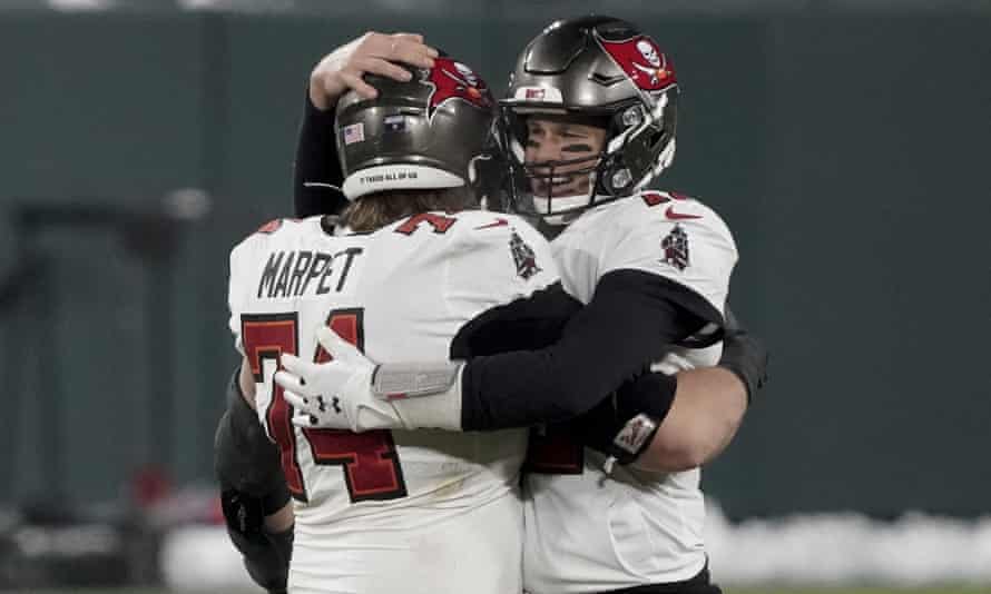 Ali Marpet celebrates with Tom Brady