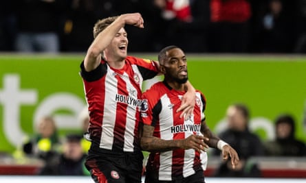 Ivan Toney (right) celebrates with teammate Nathan Collins after opening the scoring for Brentford against Nottingham Forest.