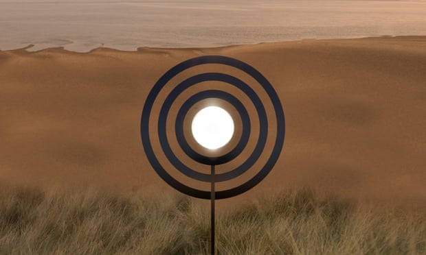 Concentric black circles around the central disc of light on the beach