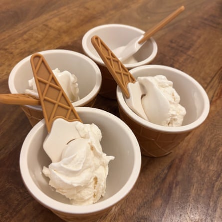 ice cream in four plastic cone-shaped bowls