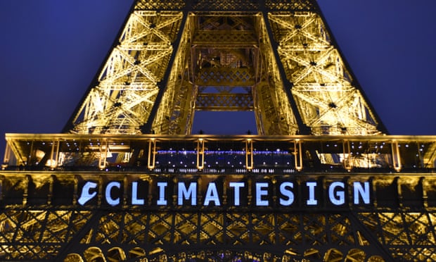 Photograph of climate sign on Eiffel Tower