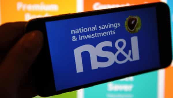 The National Savings &amp; Investments logo on a phone and the website on a computer
