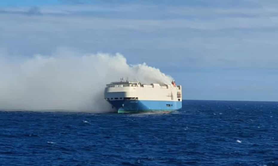 Smoke billows from the Felicity Ace, which was carrying thousands of vehicles from Germany to the US.