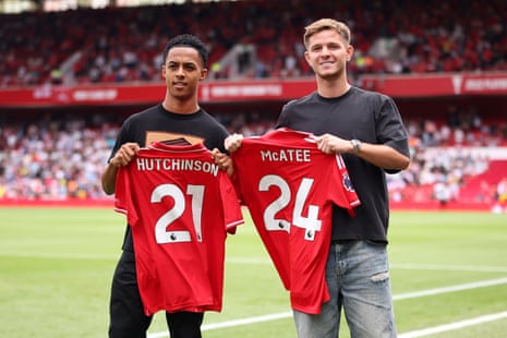 Omari Hutchinson and James McAtee of Nottingham Forest hold up their shirts as they are introduced to the fans