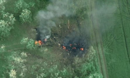 A drone image released by Freedom of Russia Legion shows what they claim is a destruction of Russian military targets near Shebekino in the Belgorod region.
