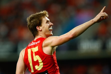 Noah Anderson celebrates booting a goal for Gold Coast