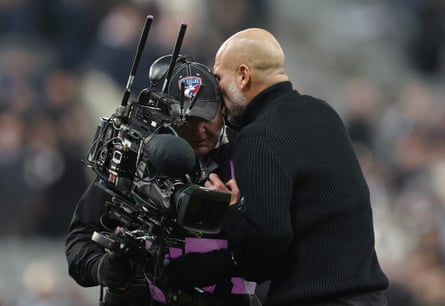 Pep Guardiola clashes with a Sky Sports TV camera operator.
