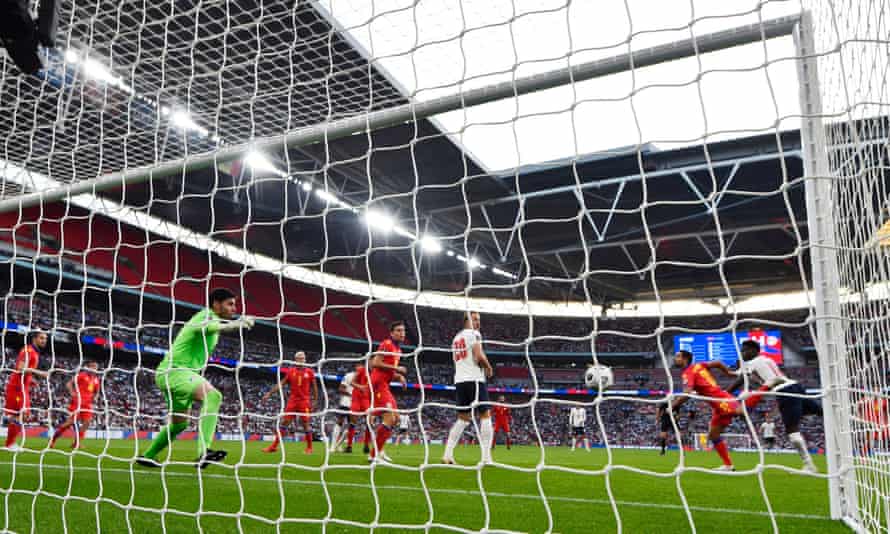 A behind-the-goal angle as Bukayo Saka scores with a header at the back post