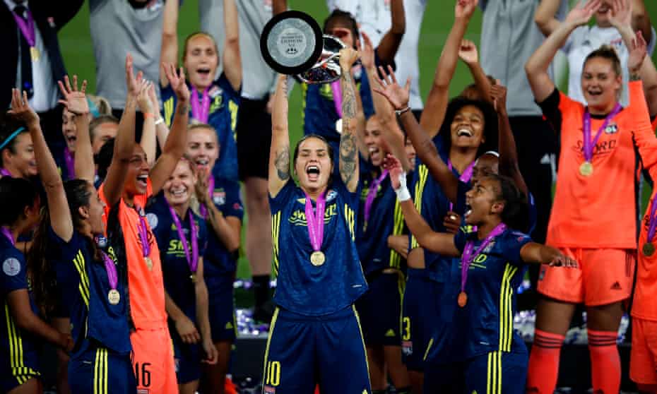 Lyon’s Dzsenifer Marozsan holds aloft the Women’s Champions League trophy after her team’s final win against Wolfsburg in August last year. 