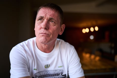 Billy Kenny, the former Everton midfielder, sits indoors gazing upward with a thoughtful expression