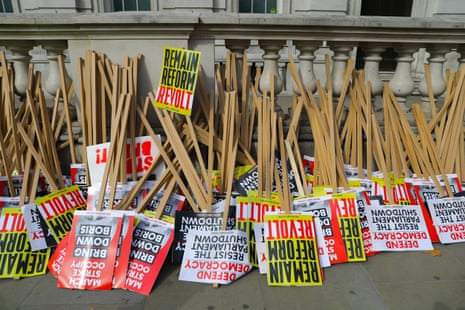 Placards outside Downing Street before a protest on Saturday.