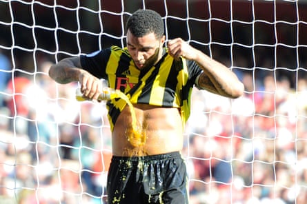 September 29: Troy Deeney of Watford pours Gatorade down himself against Arsenal.