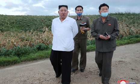 North Korean leader Kim Jong Un inspects a typhoon-damaged area in South Hwanghae Province at the end of August. Punishing local officials is a way for the North Korean leadership to avoid blame, a leading researcher says. 