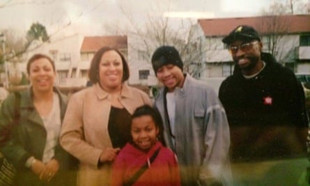 Rollie Pemberton rocking a full Rocawear tracksuit in the late 1990s with his family in Edmonton