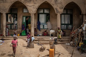 Displaced women and children camp in the half-built palace for the Emir of Anka in Zamfara state, Nigeria.