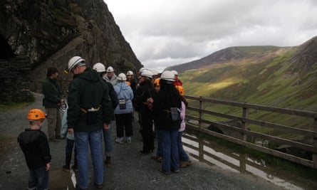 Tour group with guide at the Entrance to Honister Slate Mine, Cumbria August PM. Image shot 08/2008. Exact date unknown.BBKTAJ Tour group with guide at the Entrance to Honister Slate Mine, Cumbria August PM. Image shot 08/2008. Exact date unknown.