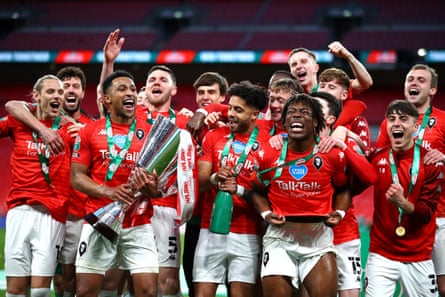 Salford City celebrate winning a trophy they had already failed to defend.