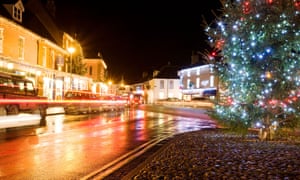 Light trails from cars passing through the Georgian market town of Holt at Christmas