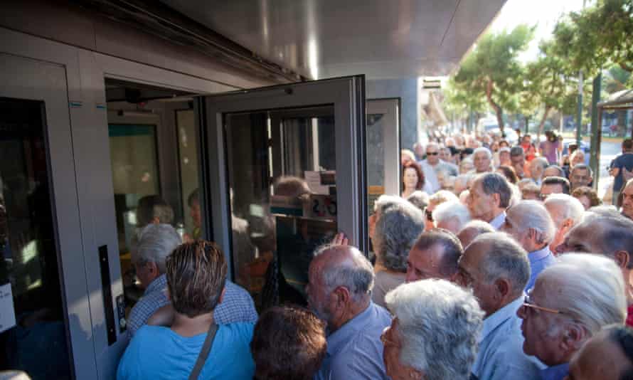 Crowds trying to enter Greek banks in Athens in July.