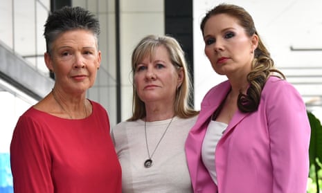 Karen Bird (left), Julie-Ann Finney (centre) and Nikki Jamieson (right), who all lost their sons to suicide, at the opening of the royal commission into defence and veteran suicide in Brisbane.