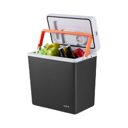 A black VonShef 20L Electric Cool Box. The lid is open and propped by an orange handle drinks and fruit pop out of the box.