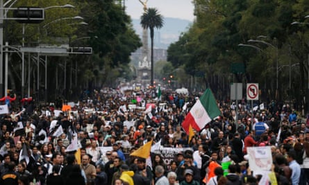 Demonstrators rally for missing Ayotzinapa students in Mexico City