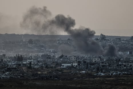 Smoke rises over buildings which used to belong to Palestinians and which have been destroyed by Israel’s military, 3 June.