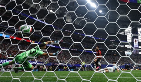 Mostafa Zico of Egypt scores his team’s second goal past Argentina keeper Emiliano Martinez of Argentina.