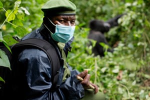 Juvenal Munganka, who has been a park ranger for 17 years, with Bonne Année