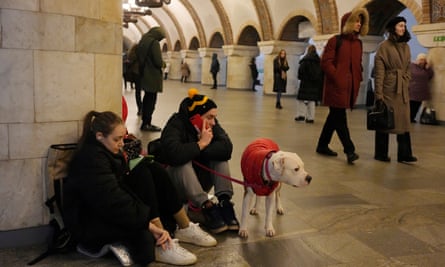 People shelter in a subway station in Kyiv