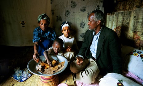 Ethiopian family sharing meal