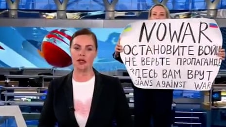 Anti-war protester interrupts Russian news broadcast – video 