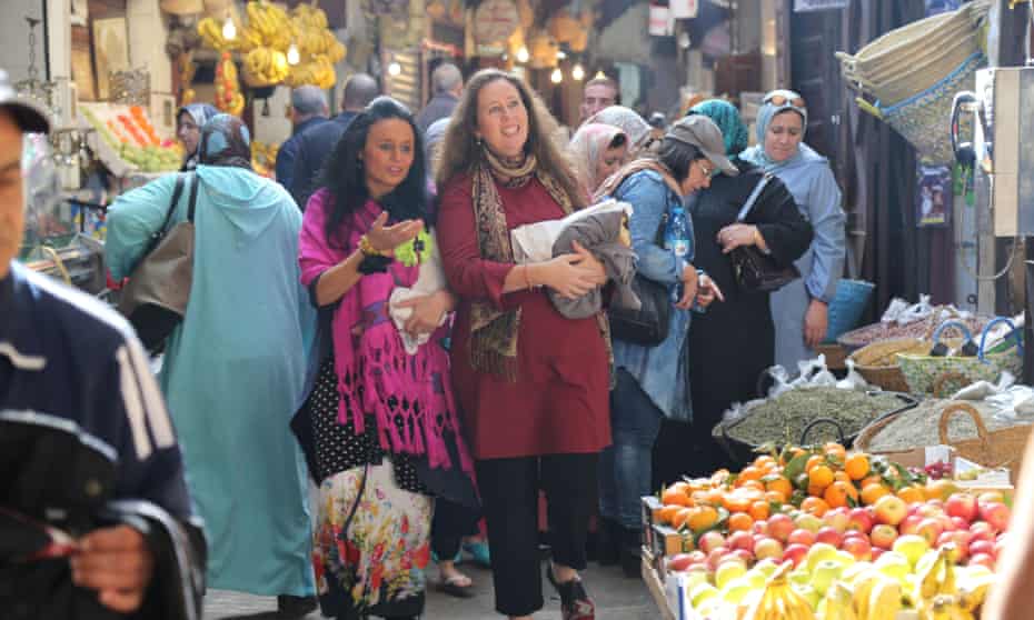 Alice Morrison (right) goes shopping with Michelin chef Najat in a Moroccan souk.