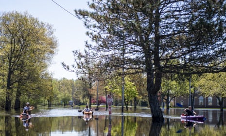 Streets are flooded as the result of a climate change event that has transformed societies