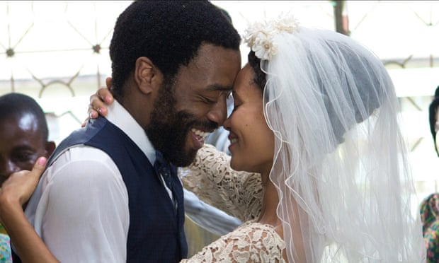 Chiwetel Ejiofor and Thandie Newton as Odenigbo and Olanna in the 2013 film of Half of a Yellow Sun.