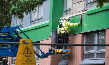 Cladding is removed from a tower block in Sheffield