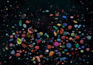 The lids from tubs of Smarties that were recovered from beaches around the UK.
