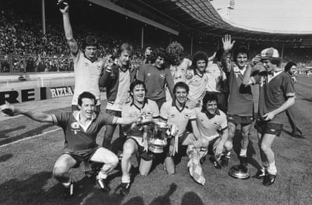 Arsenal players pose with the trophy after the 1979 FA Cup final