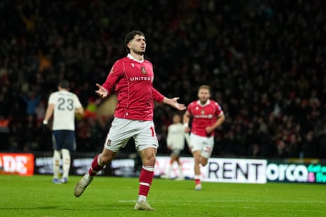 Wrexham's Liberato Cacace celebrates after scoring the opening goal against Nottingham Forest.