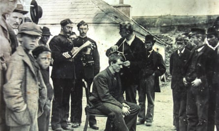 Academics measure the heads of people on Inishbofin, County Galway, in 1892.