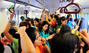 A women-only carriage on the Delhi metro, where fares have doubled since 2017.
