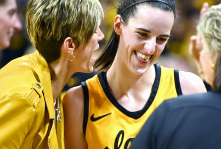 Iowa associate head coach Lisa Bluder congratulates Caitlin Clark after Tuesday’s game-winner.