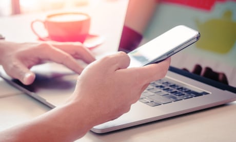 an iphone and laptop