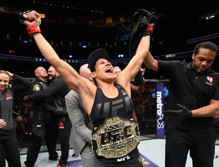 Ronda Rousey celebrating a UFC victory
