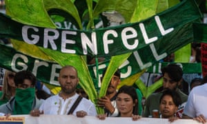 Photo by Guy Smallman. Protestors take part in the 5th annual Silent Walk at Grenfell Tower on June 14, 2022 in London, England.
