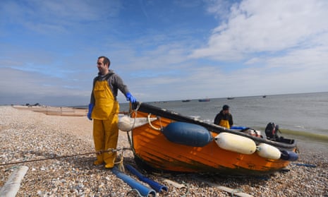 A fisherman hauls in his boat in Selsey, west Sussex.