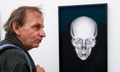 Controversial, award-winning French author Michel Houellebecq stands next to his x-rayed skull as he visits his exhibition at Manifesta 11, the roving European Biennial of contemporary art, on June 10, 2016 in Zurich.

Houellebecq shows X-rays and other visual results of his head and body in an exhibition entilted "Is Michel Houellebecq OK ?" / AFP PHOTO / FABRICE COFFRINIFABRICE COFFRINI/AFP/Getty Images
