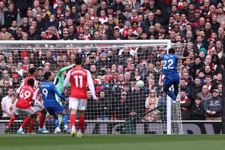 Eli Junior Kroupi goes airborne to put Bournemouth ahead against Arsenal.
