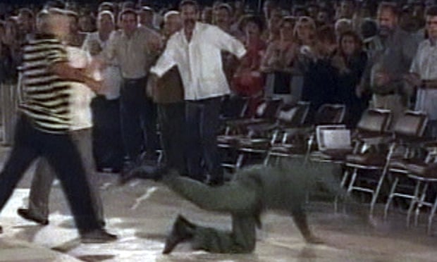 Castro falls badly after a speech in Santa Clara in 2004.