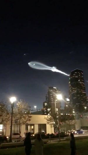 SpaceX’s Falcon 9 rocket lifts off in the air, as seen from Los Angeles, California.